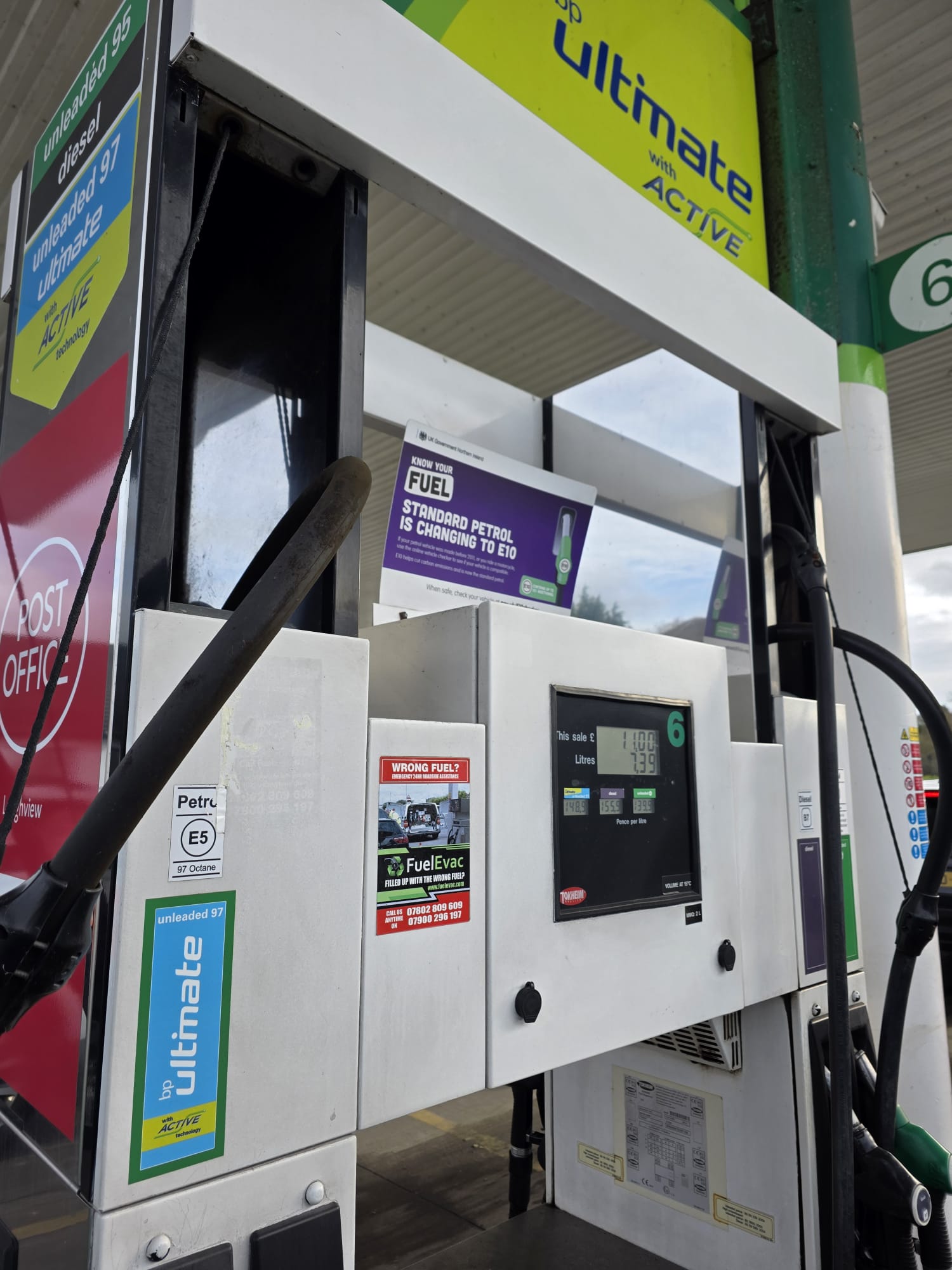 Technician performing a fuel drain on a vehicle in Belfast